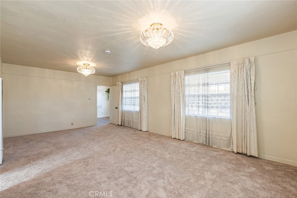 1001 West 134th Street Compton, CA 90222 - Photo 10 of 44 a view of an empty room with a window