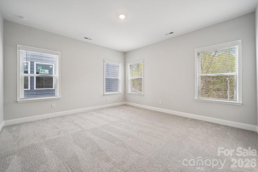 5041 Duval Circle Tega Cay, SC 29708 - Photo 24 of 47 a view of an empty room with a window