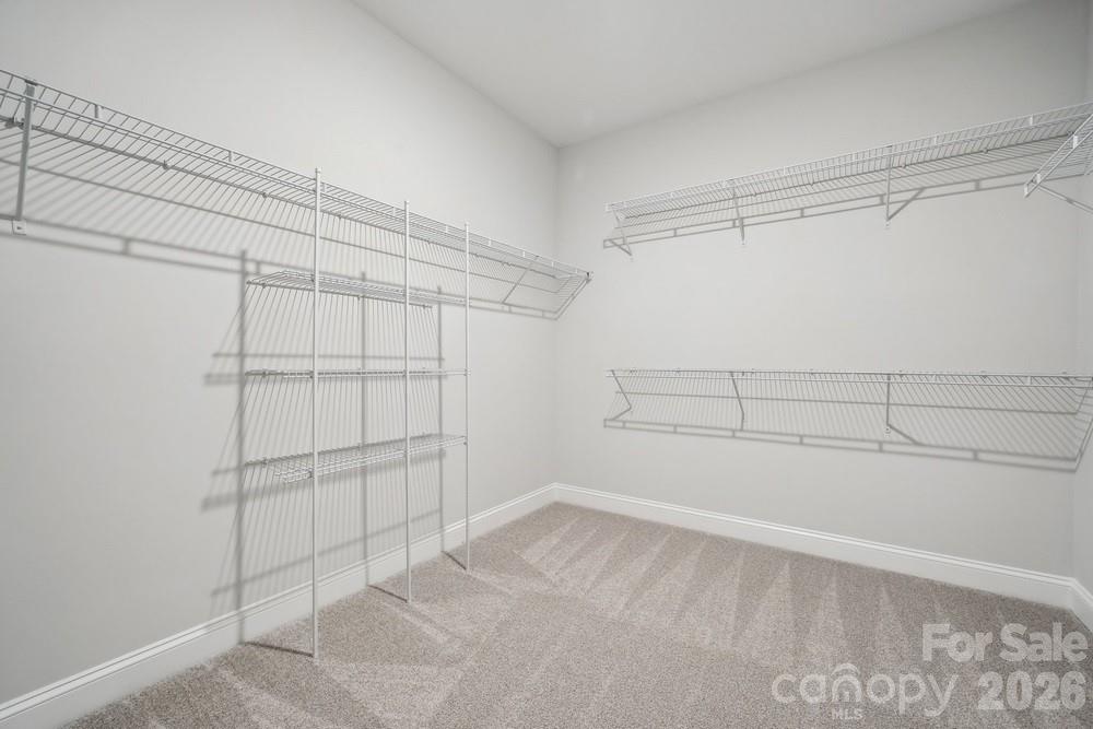 5041 Duval Circle Tega Cay, SC 29708 - Photo 28 of 47 a view of a room with racks on the wall