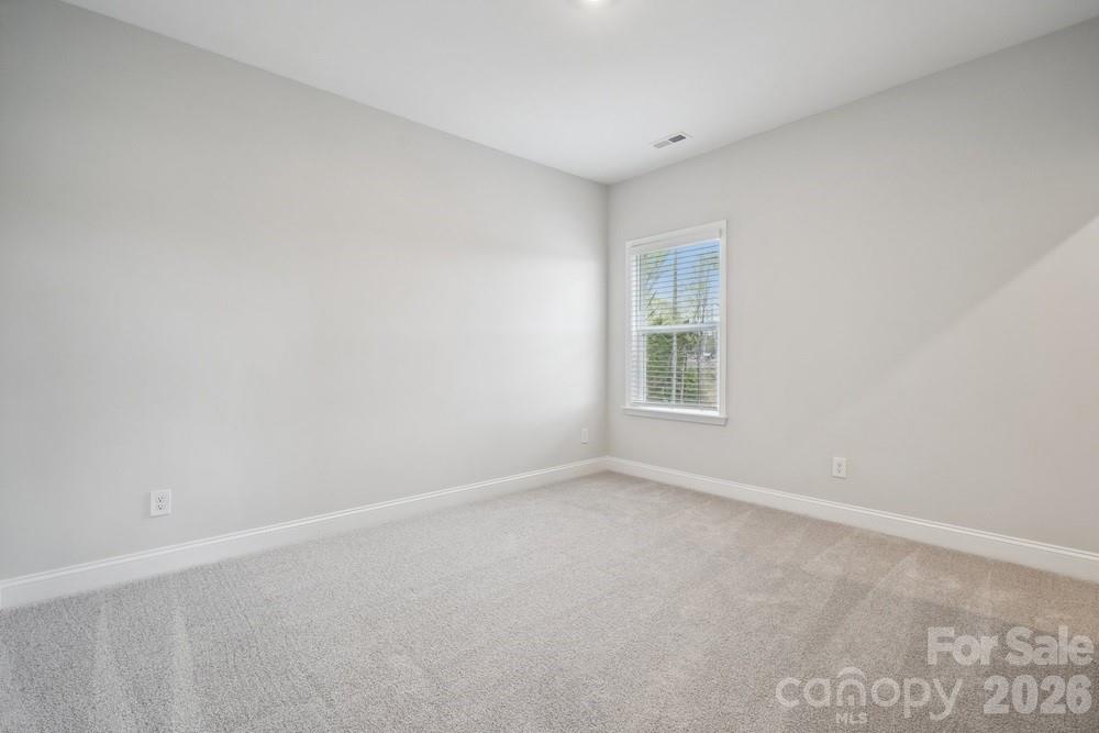 5041 Duval Circle Tega Cay, SC 29708 - Photo 30 of 47 an empty room with a window
