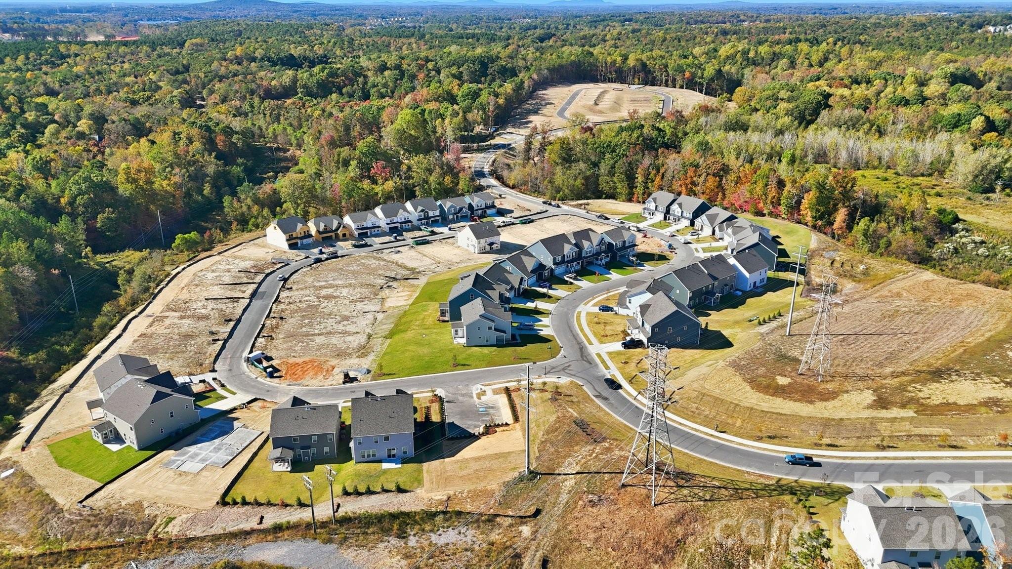 5041 Duval Circle Tega Cay, SC 29708 - Photo 36 of 47 an aerial view of a swimming pool with outdoor seating