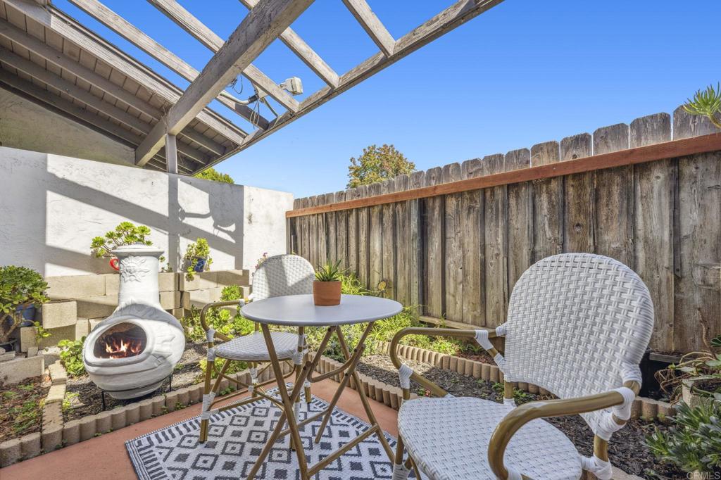 3431 Seabreeze Walk Oceanside, CA 92056 - Photo 20 of 23 a view of a chairs and table in patio
