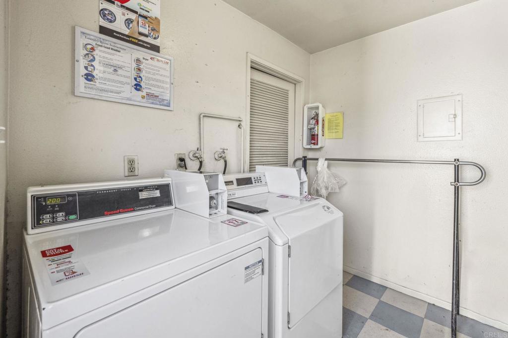 3431 Seabreeze Walk Oceanside, CA 92056 - Photo 23 of 23 a utility room with dryer and washer