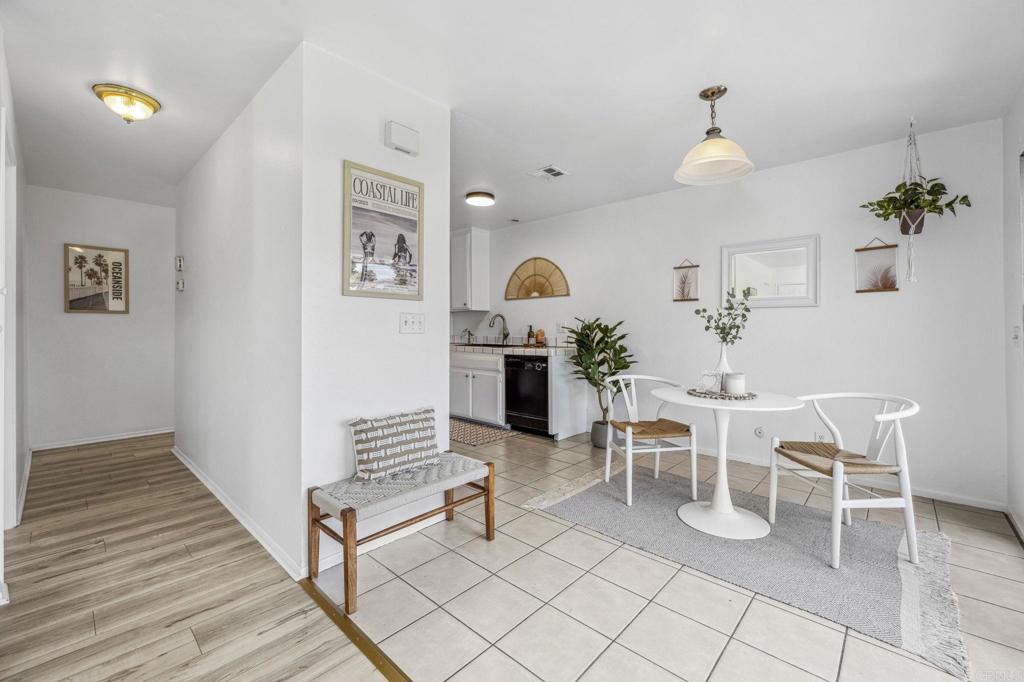 3431 Seabreeze Walk Oceanside, CA 92056 - Photo 8 of 23 a view of a dining room with furniture