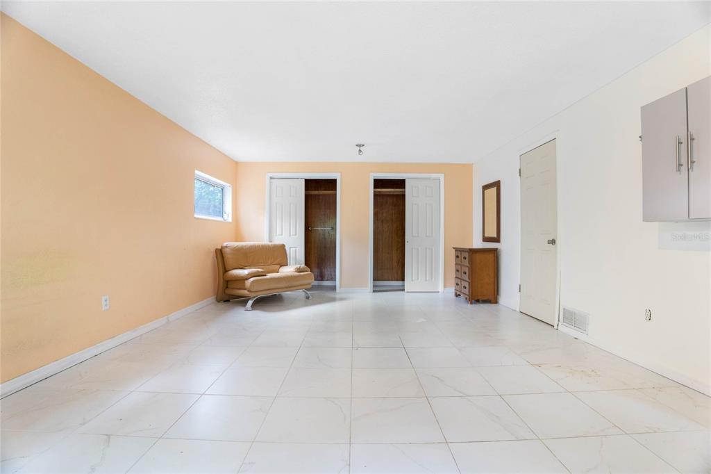 2667 Spring Court DeLand, FL 32720 - Photo 25 of 29 DOWNSTAIRS BEDROOM 2