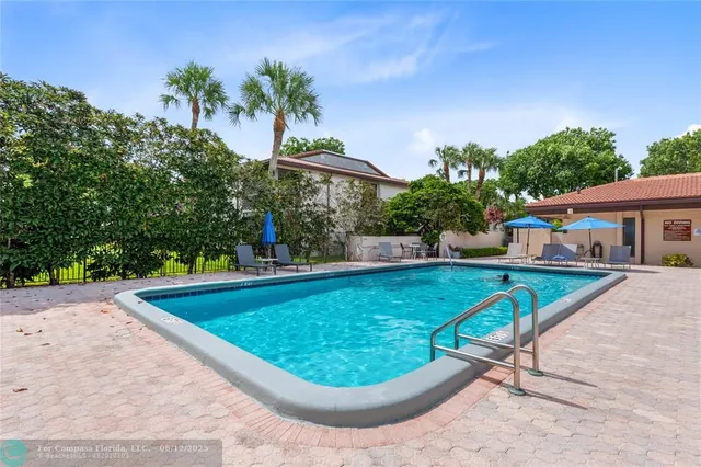 a view of kitchen with furniture and garden