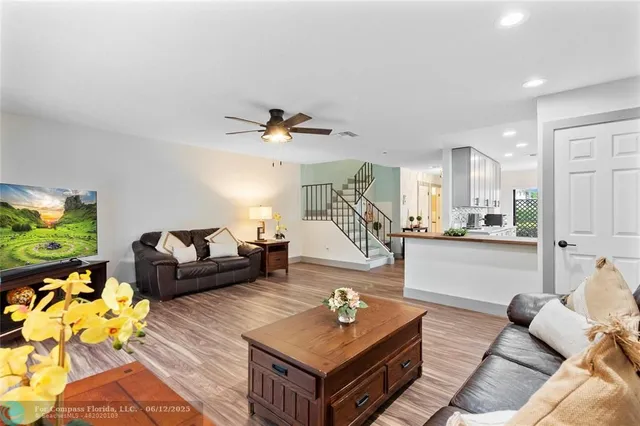 a view of a hallway with washer and dryer