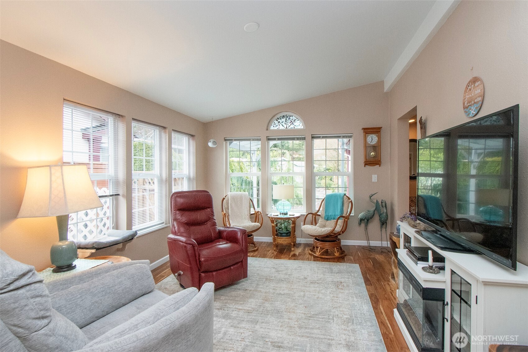 151 Green Meadows Drive Sequim, WA 98382 - Photo 11 of 40 a living room with furniture and a flat screen tv