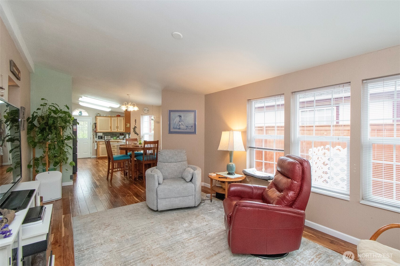 151 Green Meadows Drive Sequim, WA 98382 - Photo 12 of 40 a living room with furniture and a large window