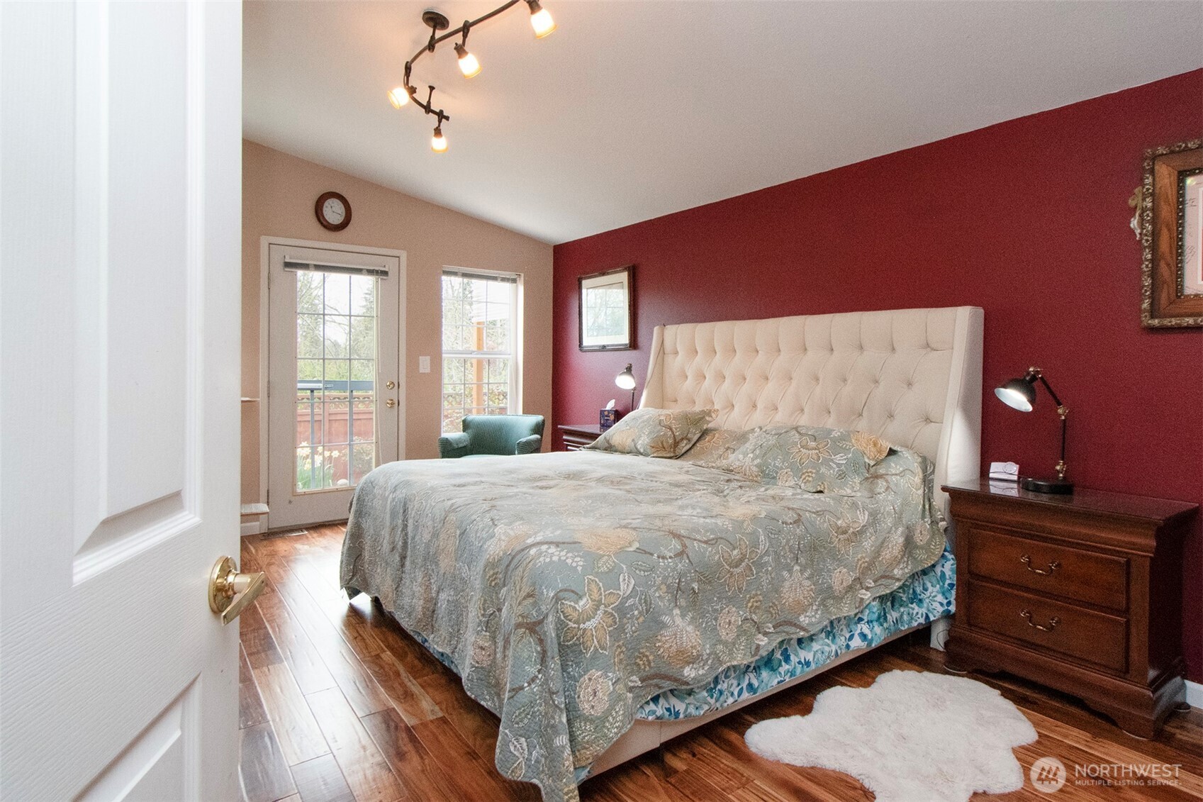 151 Green Meadows Drive Sequim, WA 98382 - Photo 17 of 40 a bedroom with a bed and a dresser