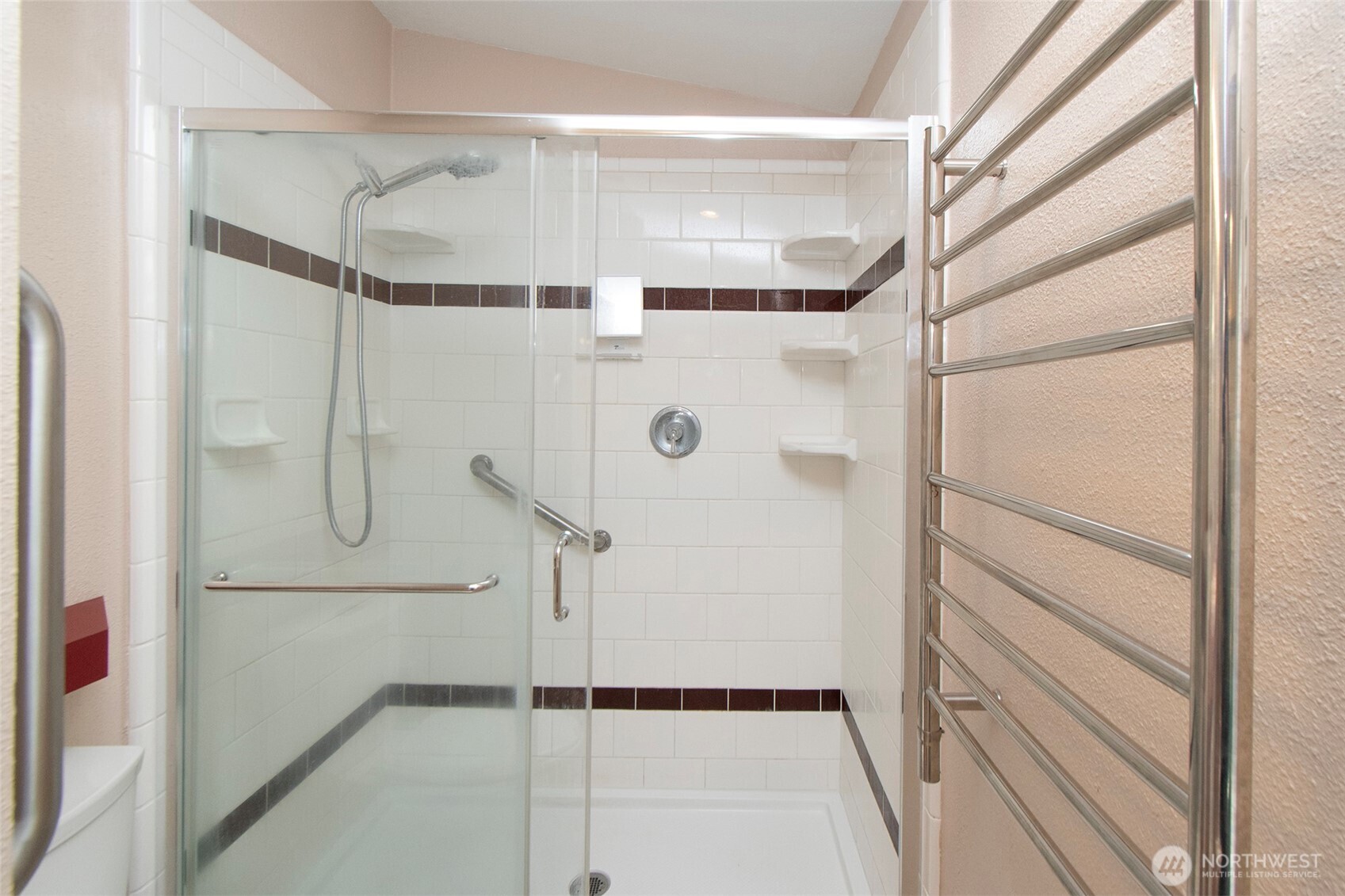 151 Green Meadows Drive Sequim, WA 98382 - Photo 21 of 40 a bathroom with a glass shower door