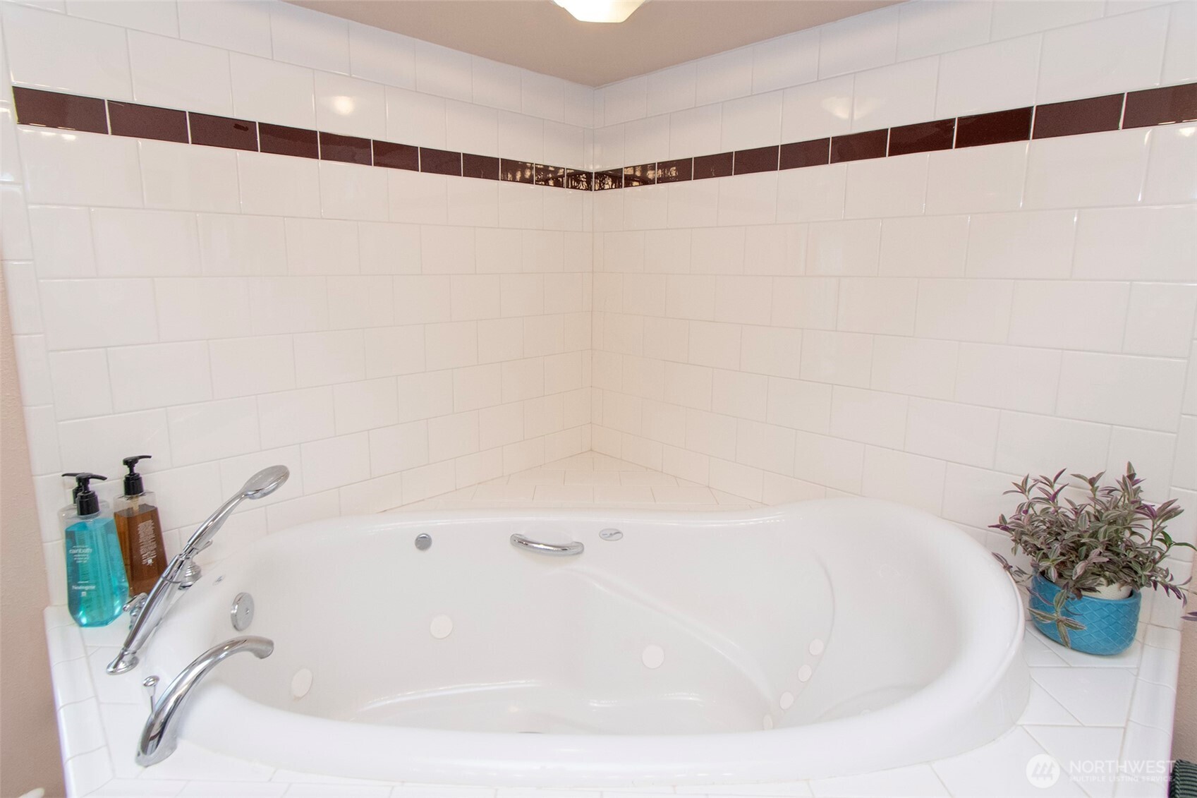 151 Green Meadows Drive Sequim, WA 98382 - Photo 22 of 40 a white bath tub sitting in a bathroom