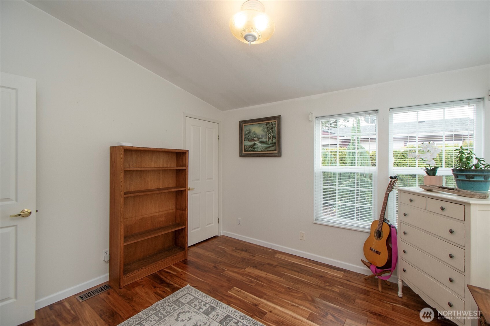 151 Green Meadows Drive Sequim, WA 98382 - Photo 26 of 40 a view of room with wooden floor and windows