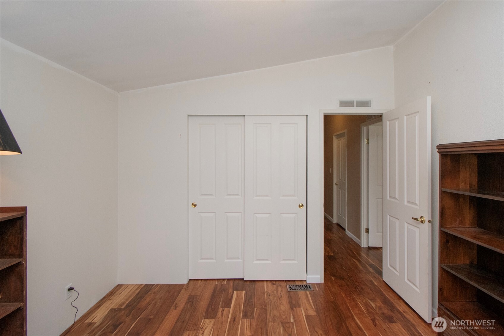 151 Green Meadows Drive Sequim, WA 98382 - Photo 29 of 40 wooden floor in an empty room