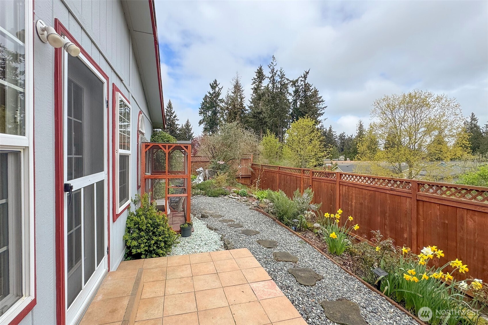 151 Green Meadows Drive Sequim, WA 98382 - Photo 38 of 40 a view of a pathway with a flower garden