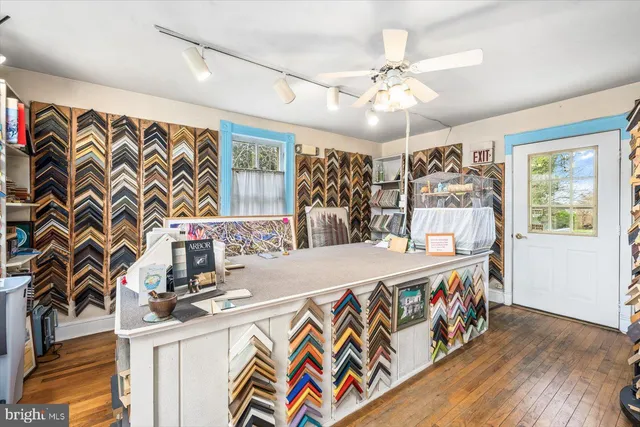 a very nice looking dining room with a large window