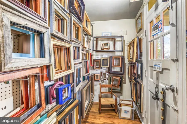 a view of a livingroom with furniture window and gym equipment