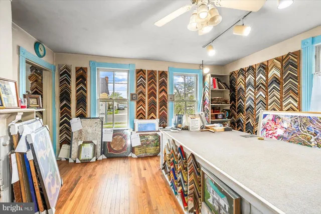 a view of a chairs and table in a room