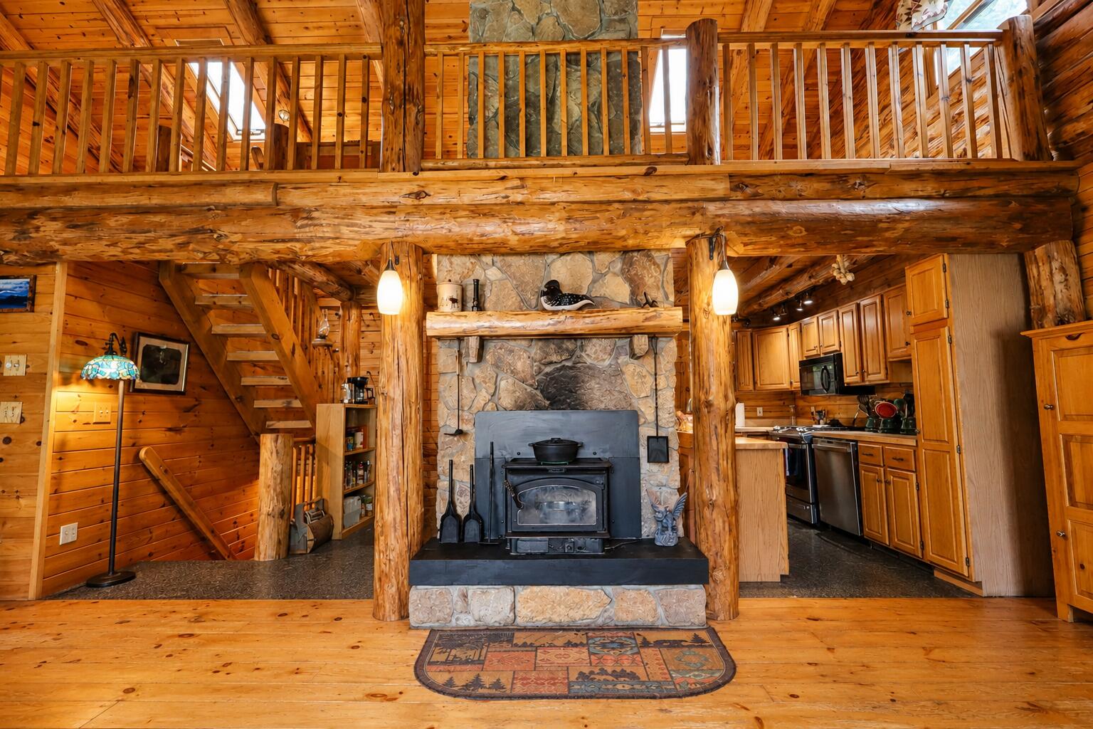567 Big Moose Pt Road Greenville Junction, ME 04442 - Photo 10 of 45 fireplace