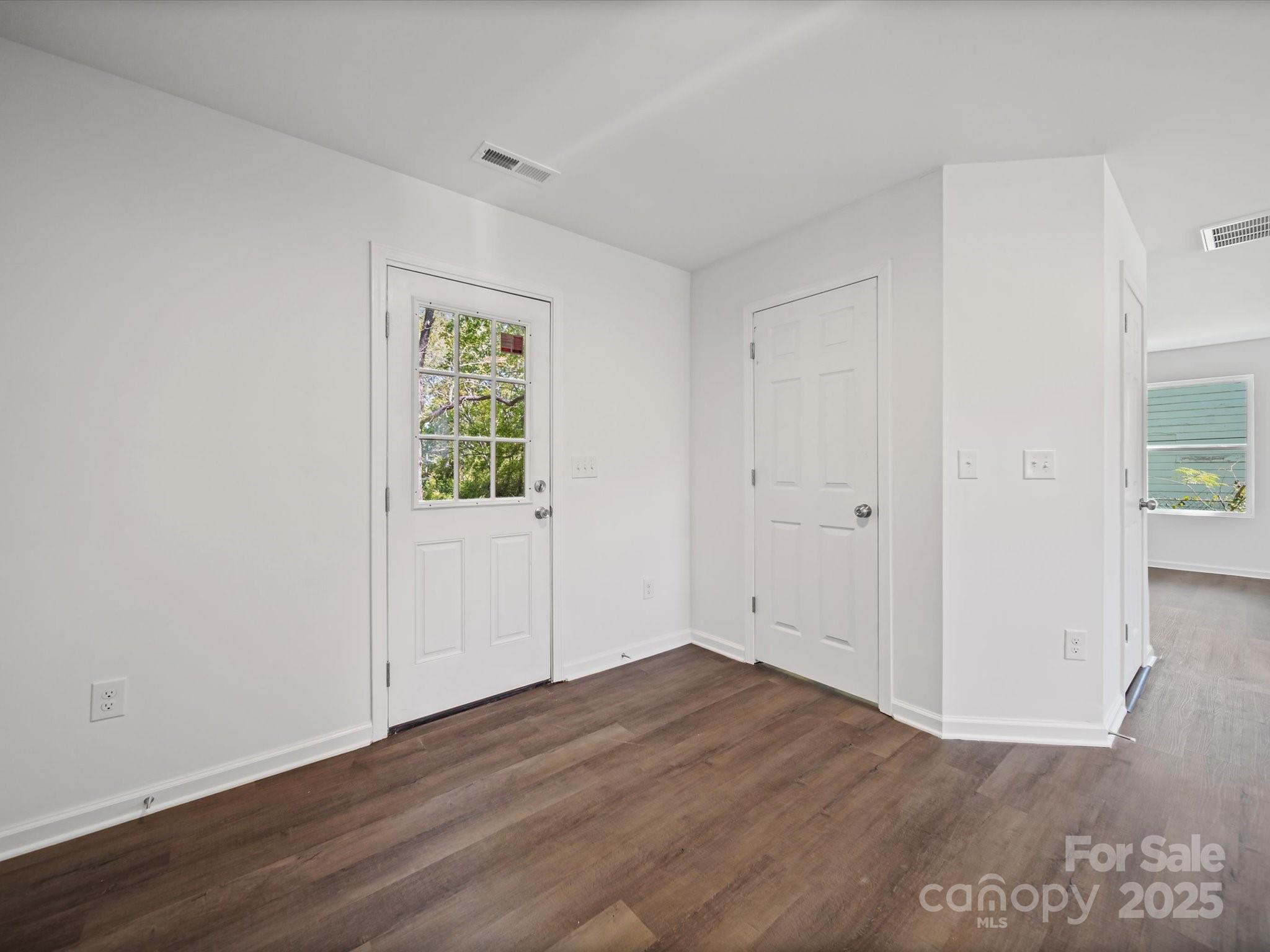 185 West End Street Chester, SC 29706 - Photo 14 of 26 a view of an empty room with wooden floor