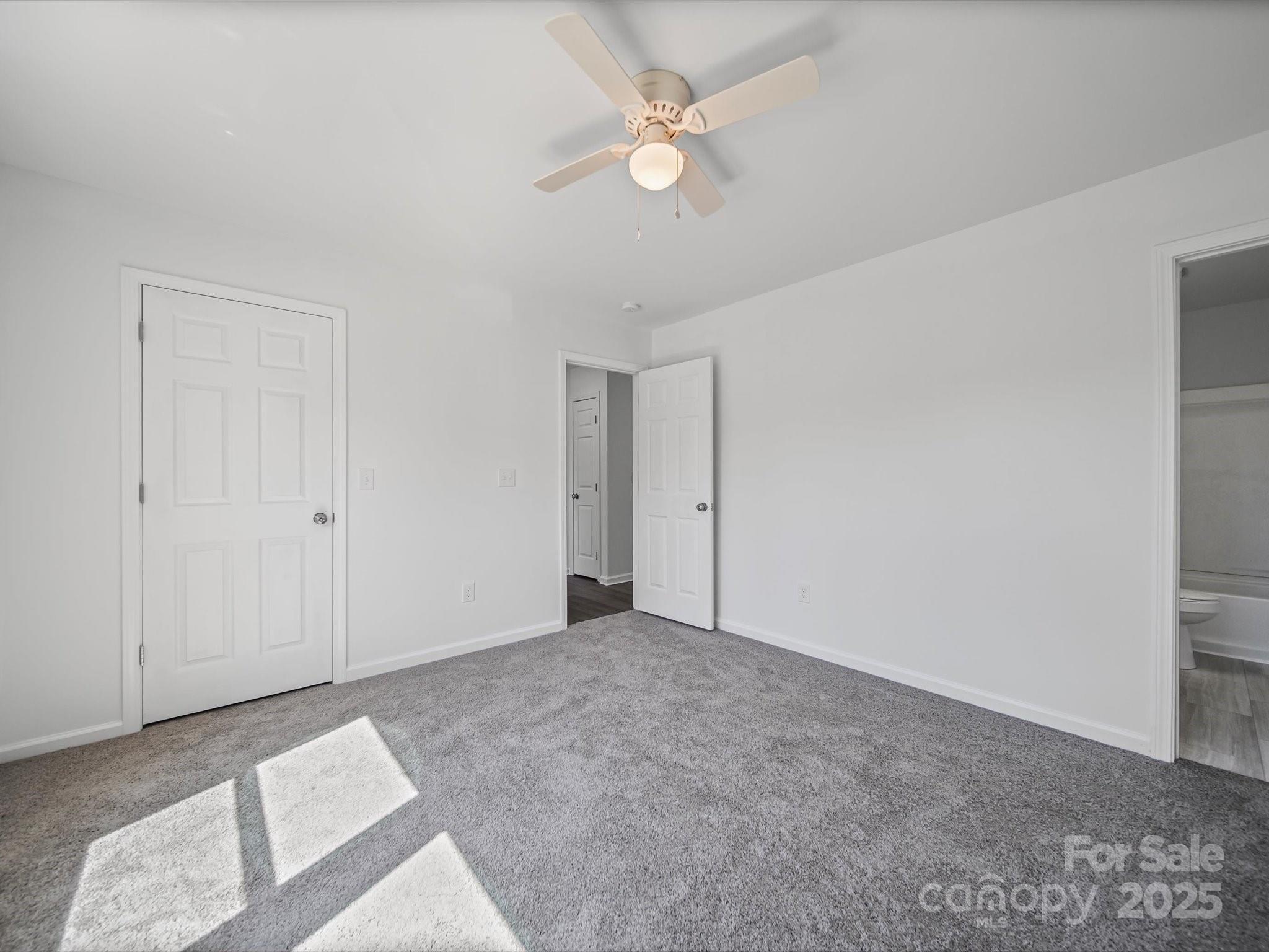 185 West End Street Chester, SC 29706 - Photo 21 of 26 an empty room with fan and a ceiling fan