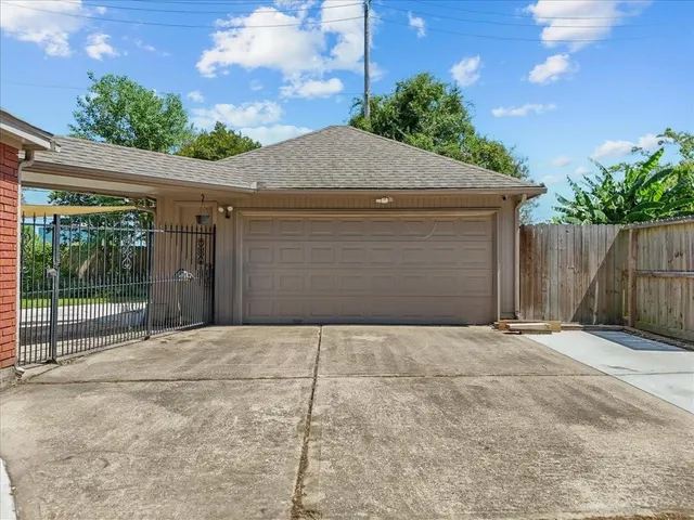 an aerial view of house with yard swimming pool and outdoor seating
