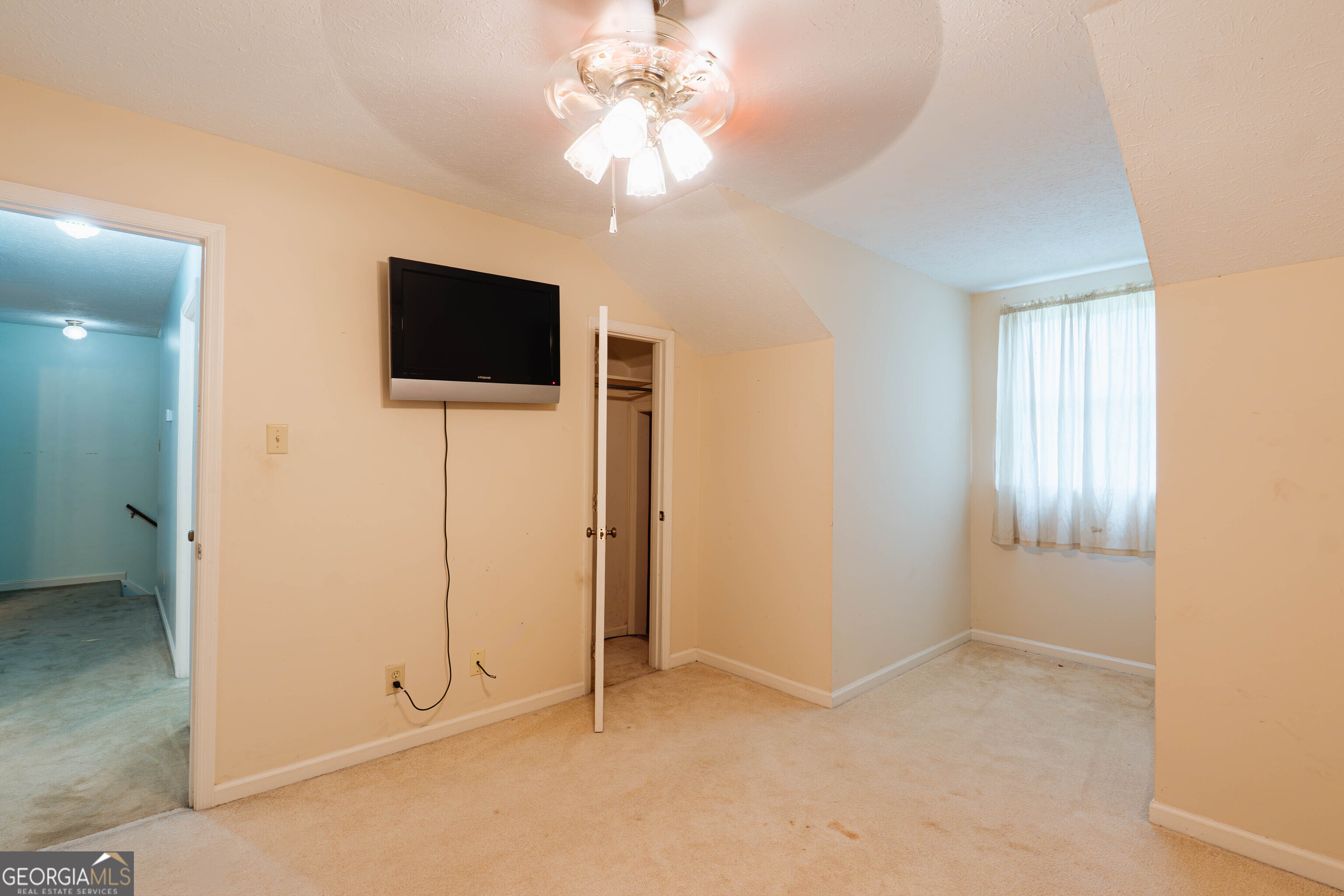 139 Cords Bridge Road Northeast Milledgeville, GA 31061 - Photo 24 of 35 an empty room with windows and fan