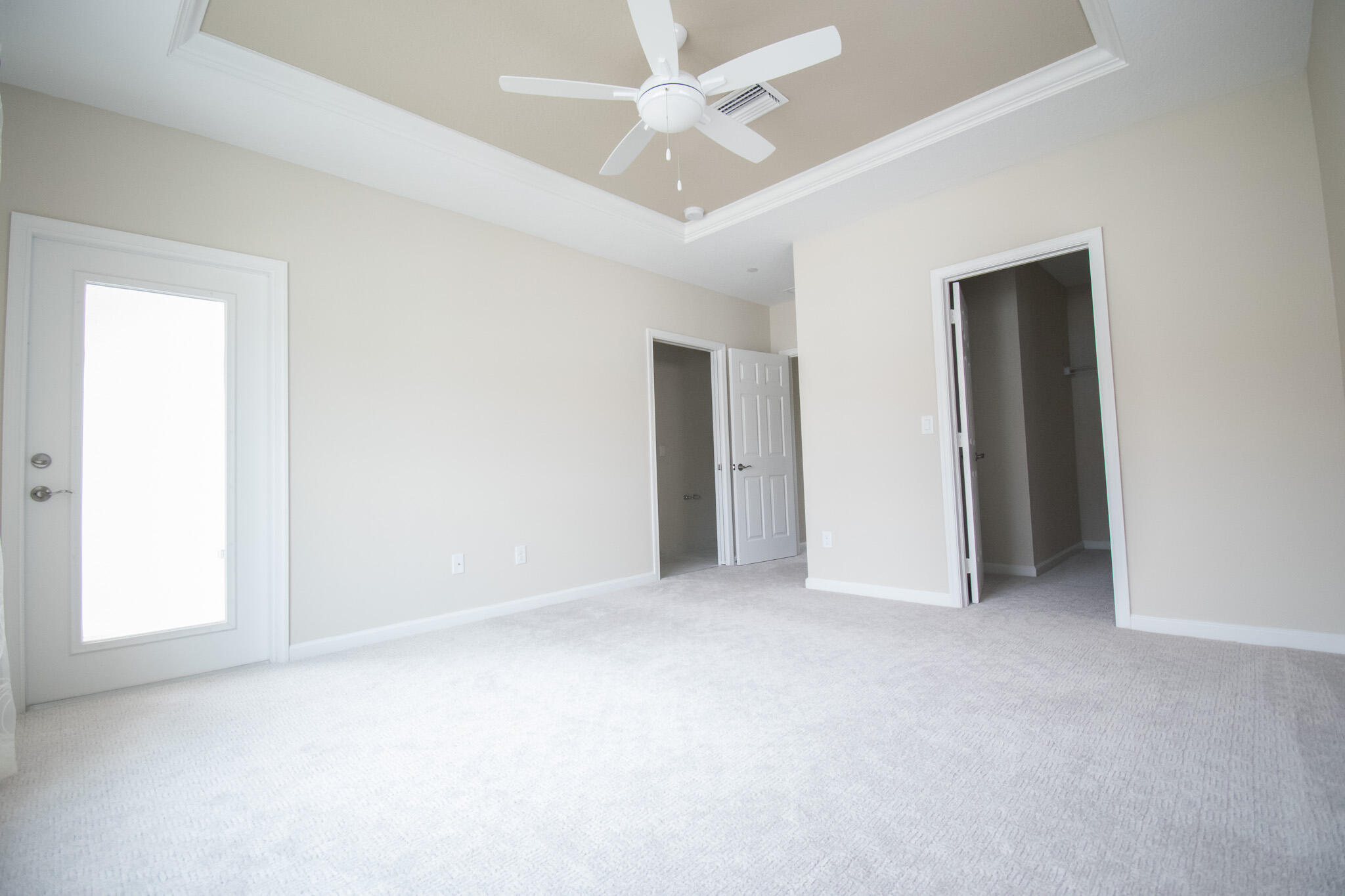 14426 Emerald Pl Way Delray Beach, FL 33484 - Photo 8 of 15 an empty room with fan and a ceiling fan