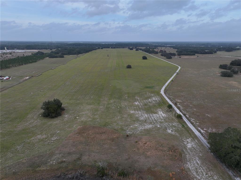 26049 Fair Street Astatula, FL 34705 - Photo 12 of 21 a view of a lake view and mountain view