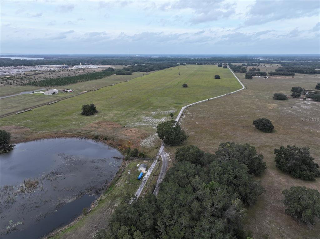 26049 Fair Street Astatula, FL 34705 - Photo 14 of 21 an aerial view of a houses with outdoor space