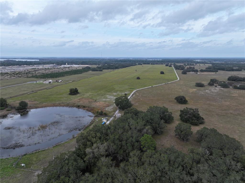 26049 Fair Street Astatula, FL 34705 - Photo 16 of 21 an aerial view of a houses with outdoor space
