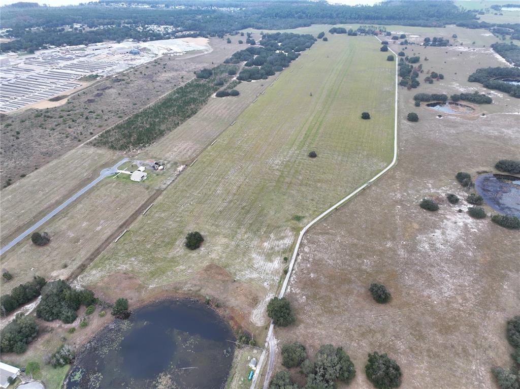 26049 Fair Street Astatula, FL 34705 - Photo 18 of 21 a view of a water heater room
