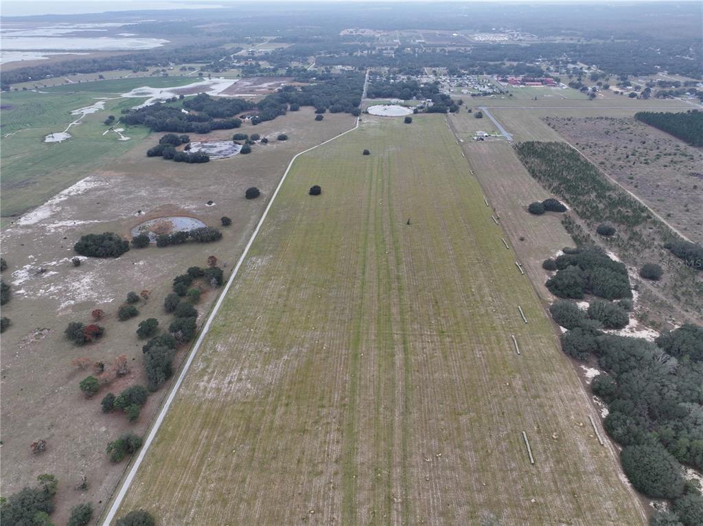 26049 Fair Street Astatula, FL 34705 - Photo 2 of 21 an aerial view of a house