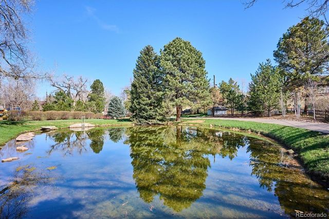 a view of a lake with houses in outdoor space