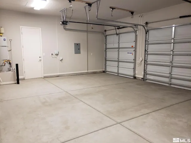 a view of a house with backyard and a porch
