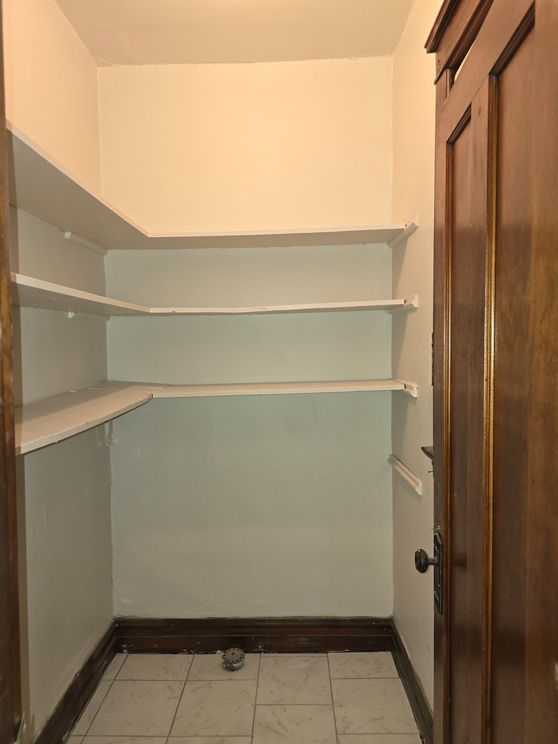 7517 South Green Street Chicago, IL 60620 - Photo 14 of 22 a close up view of shower