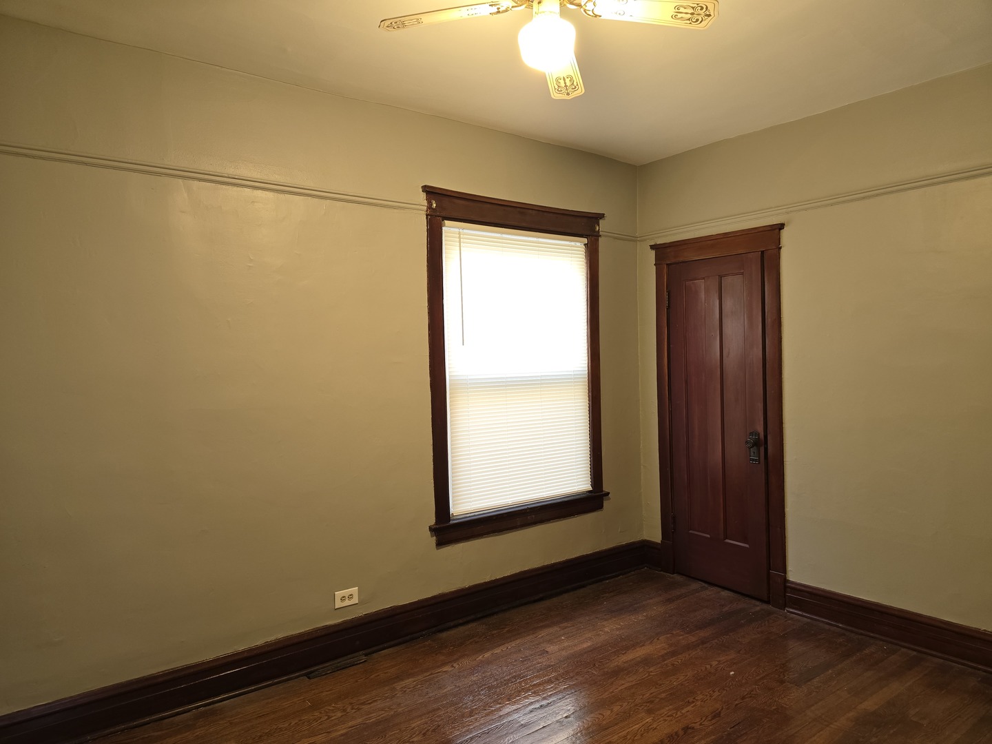 7517 South Green Street Chicago, IL 60620 - Photo 16 of 22 an empty room with a empty space and a window