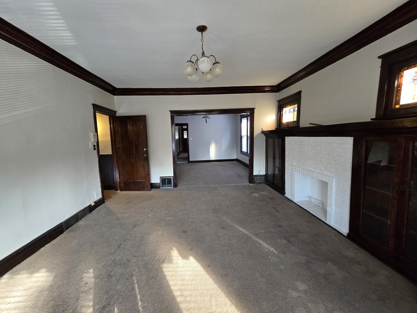 7517 South Green Street Chicago, IL 60620 - Photo 6 of 22 a view of a hallway with a room
