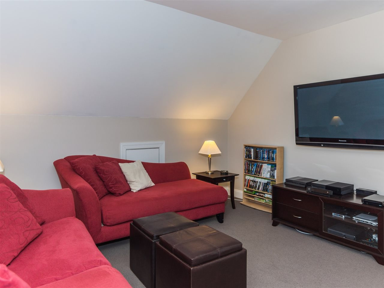 1503 Patterson Grove Road Apex, NC 27502 - Photo 19 of 25 The angled ceiling gives this room character and charm. Bonus Room