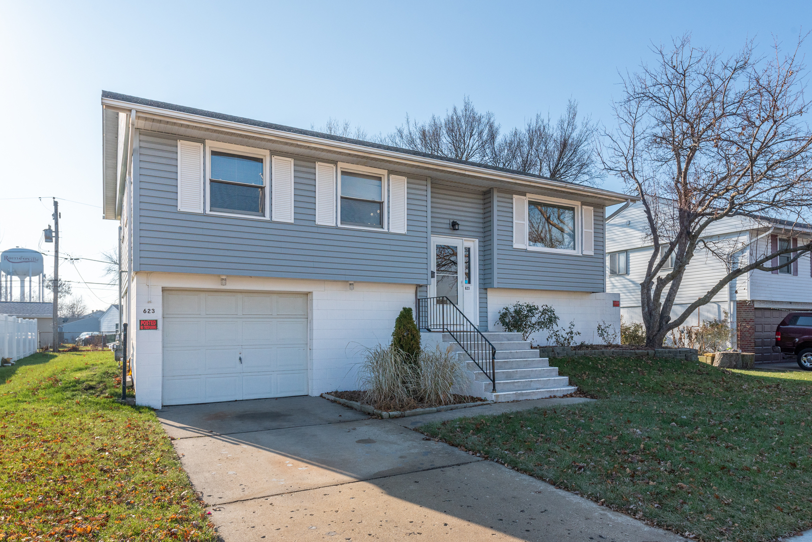 623 West Romeo Road Romeoville, IL 60446 - Photo 2 of 19 a view of a house with a yard