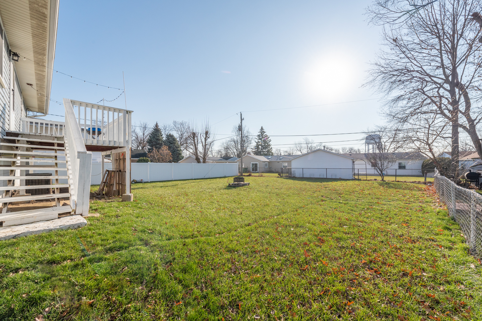 623 West Romeo Road Romeoville, IL 60446 - Photo 14 of 19 a view of a swimming pool with an outdoor seating and a garden