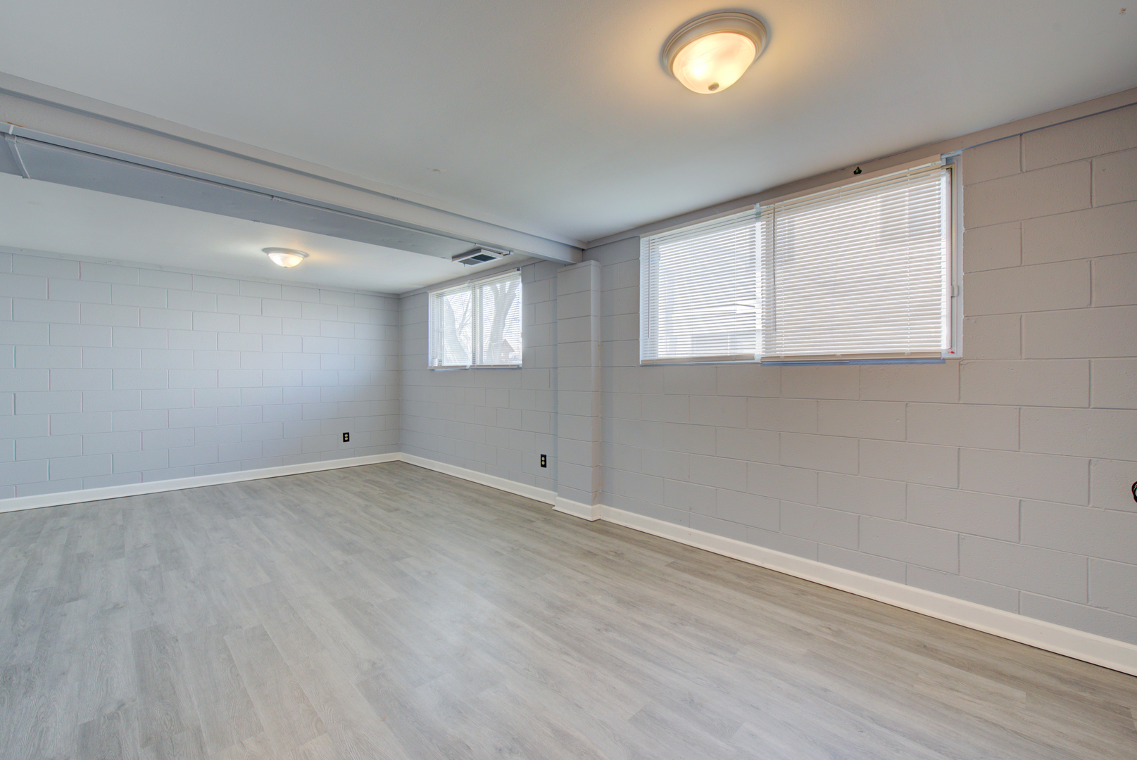 623 West Romeo Road Romeoville, IL 60446 - Photo 17 of 19 wooden floor in an empty room with a window