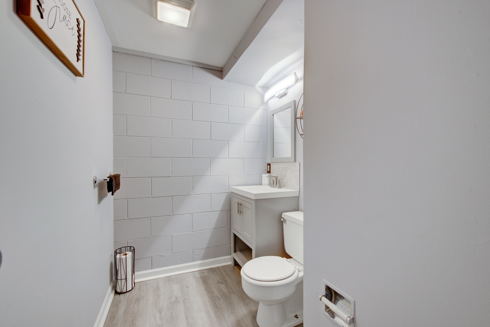 623 West Romeo Road Romeoville, IL 60446 - Photo 18 of 19 a bathroom with a sink a toilet and shower