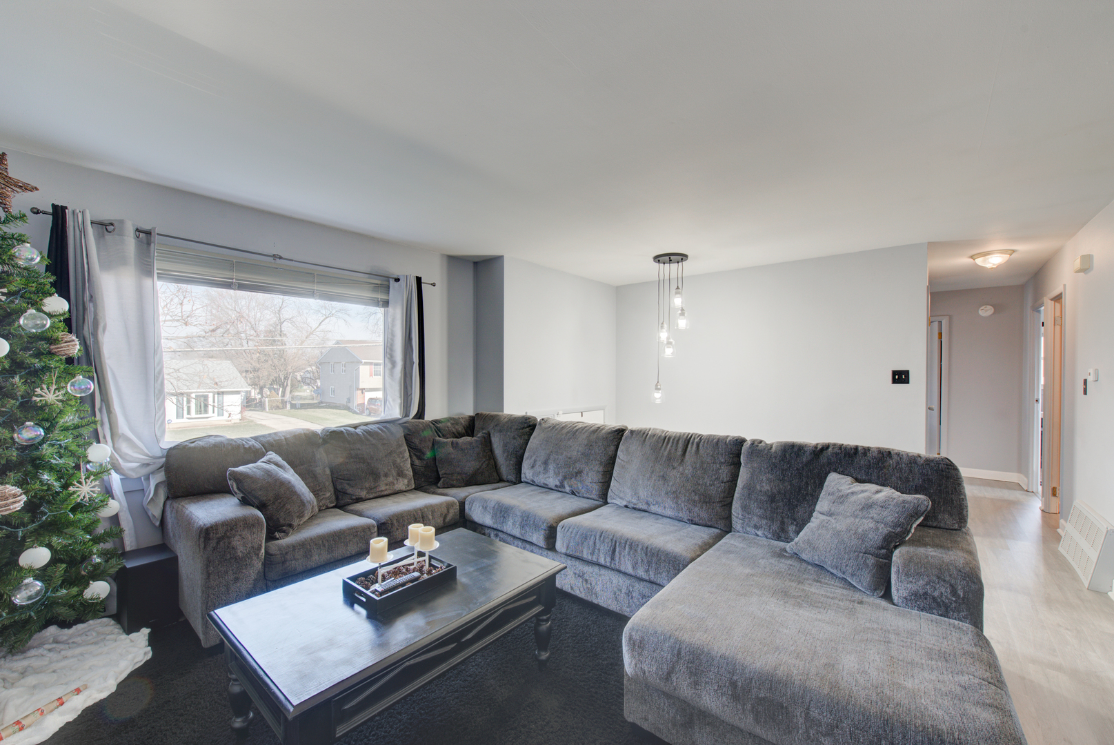 623 West Romeo Road Romeoville, IL 60446 - Photo 5 of 19 a living room with furniture and a large window