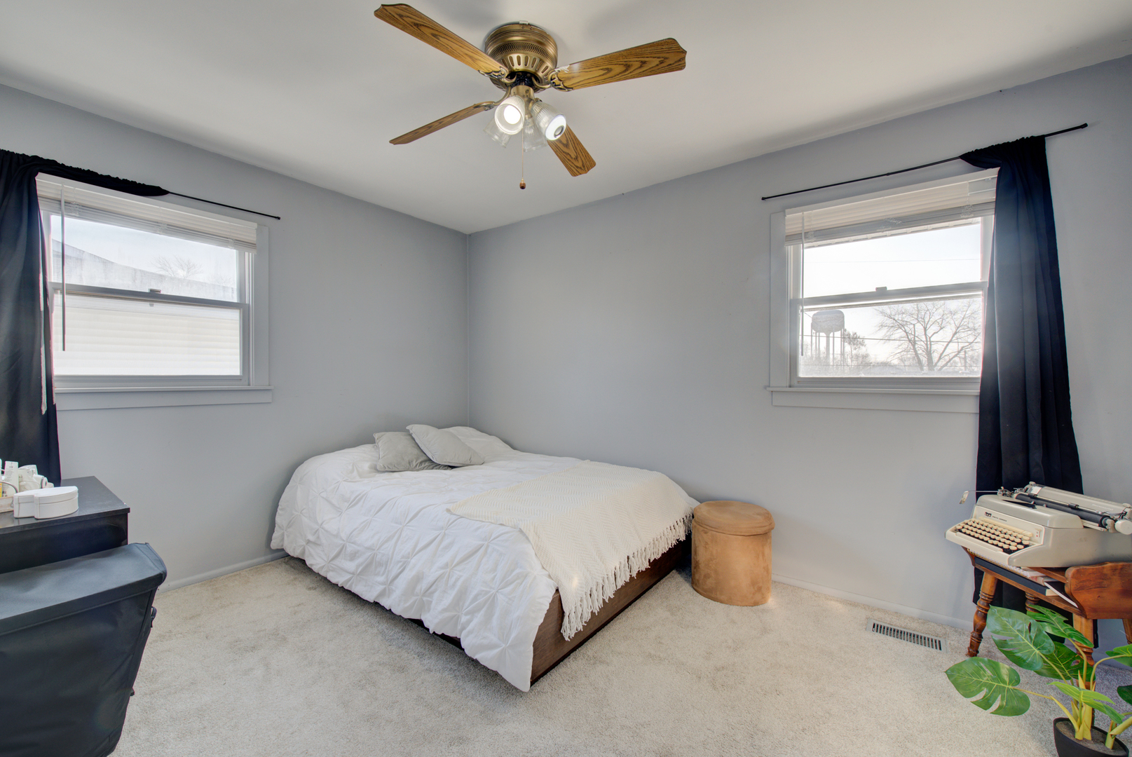 623 West Romeo Road Romeoville, IL 60446 - Photo 9 of 19 a bedroom with a bed and a window