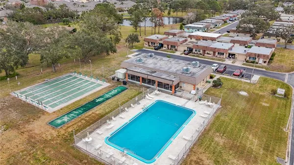 a aerial view of a house with a yard