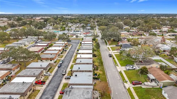 an aerial view of residential building with parking space