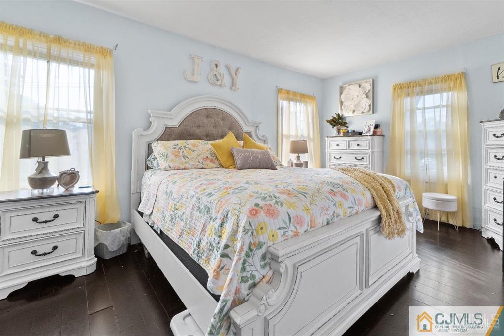 701 Spruce Street Roselle, NJ 07203 - Photo 22 of 28 a bedroom with a bed and a dresser