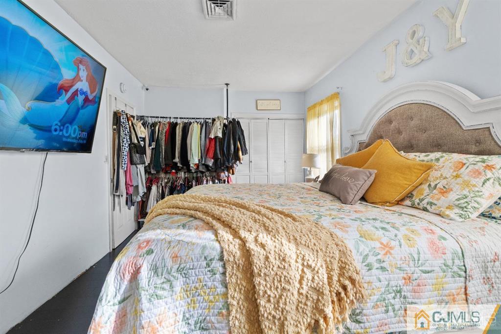 701 Spruce Street Roselle, NJ 07203 - Photo 23 of 28 a bed room with a bed