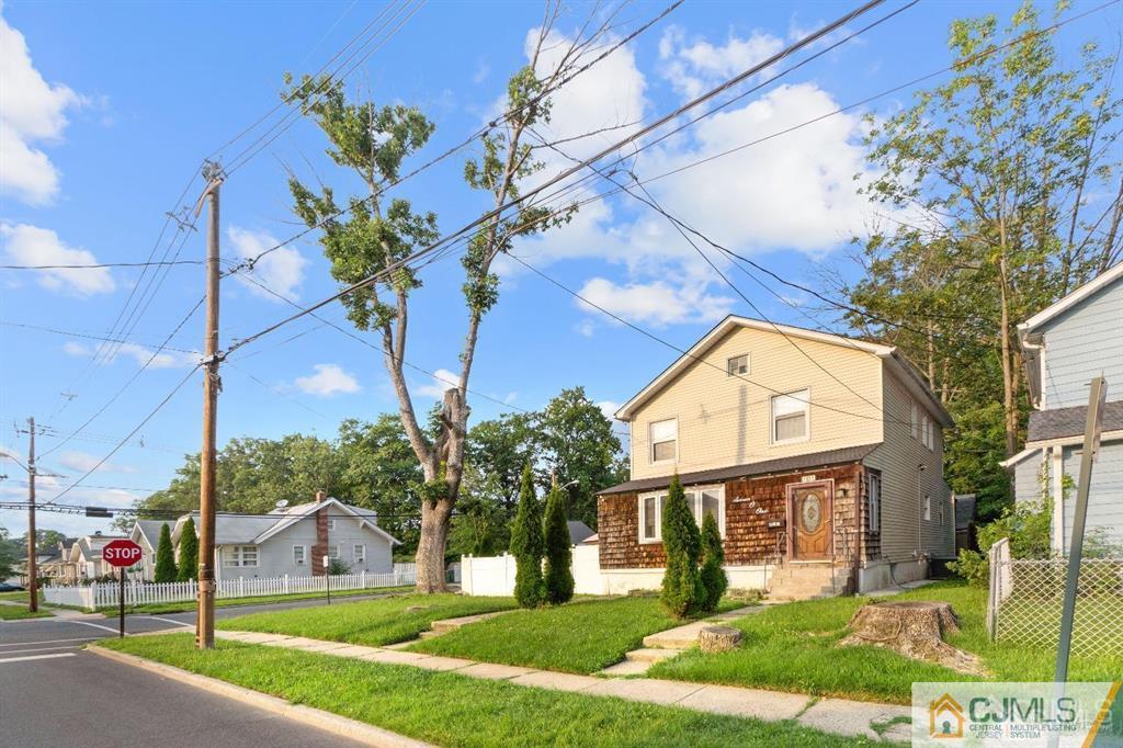 701 Spruce Street Roselle, NJ 07203 - Photo 3 of 28 a view of a house with a garden
